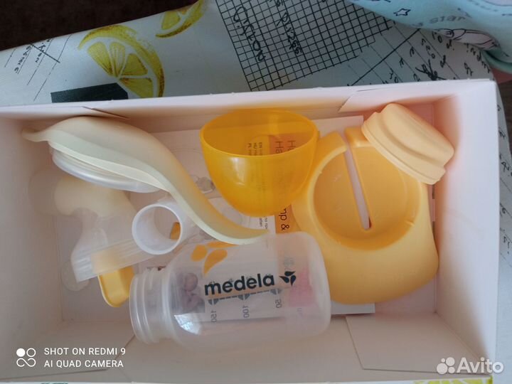 Молокоотсос medela ручной