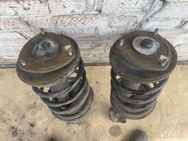 Стойка передняя Hyundai Santa Fe 2 (CM)