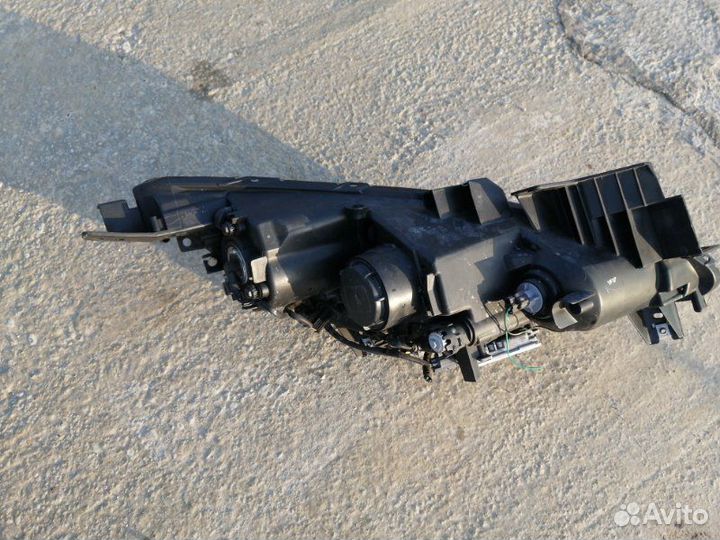 Фара передняя левая Mazda Biante ccef3W