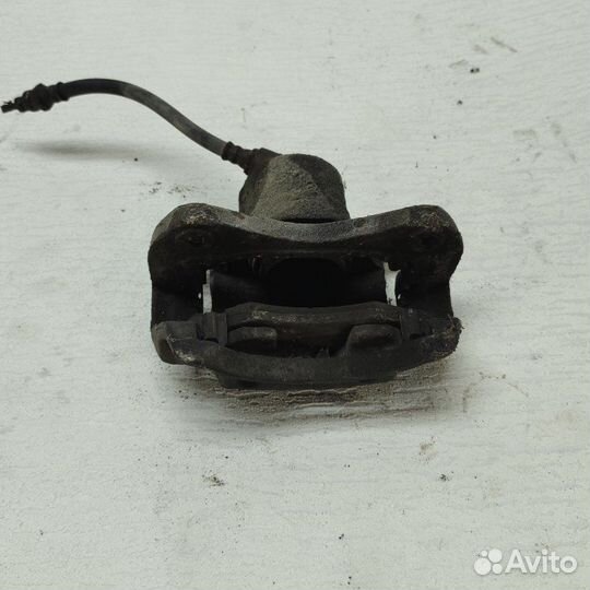 Суппорт тормозной передний левый Hyundai Lantra J1