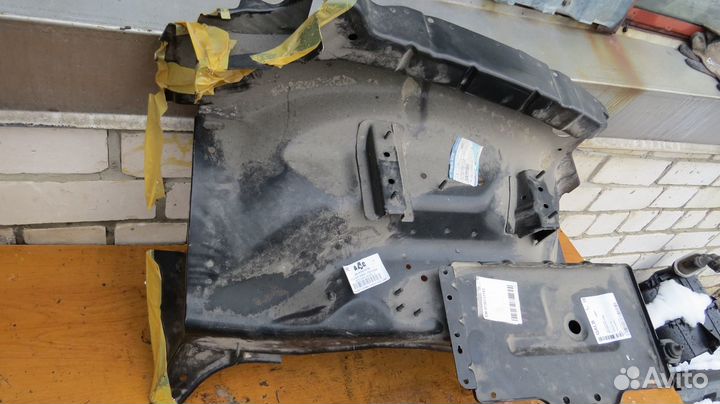 Брызговик левый Ssang Yong Actyon Sports