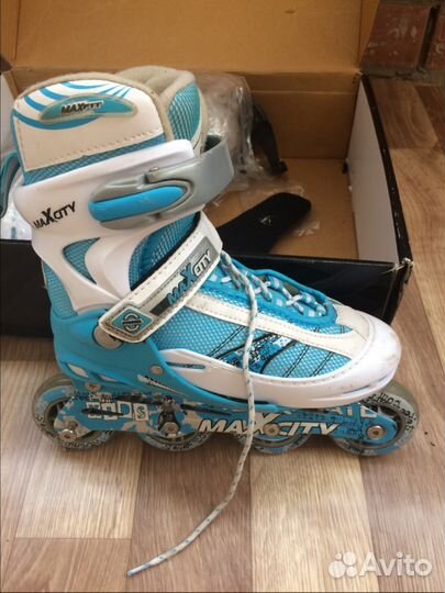 Роликовые коньки