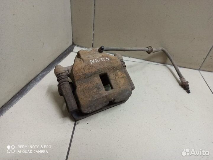 Передний суппорт левый Nissan Almera N16 2002-2006