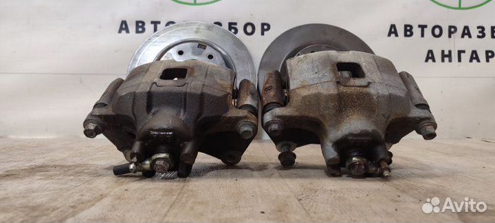 Суппорта и диски передняя Mitsubishi Lancer 10