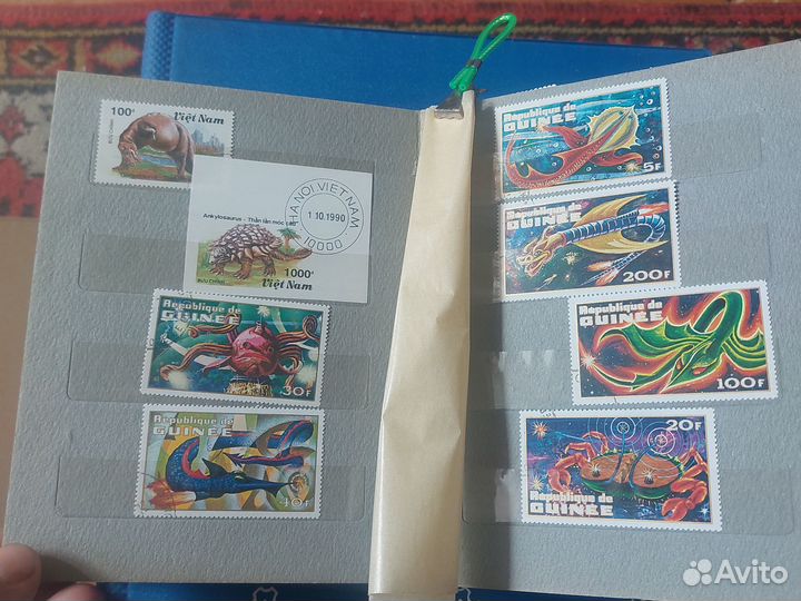 Альбом с почтовыми марками динозавры.Африка.Азия