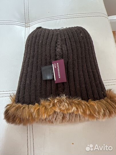 Женские меховые шапки