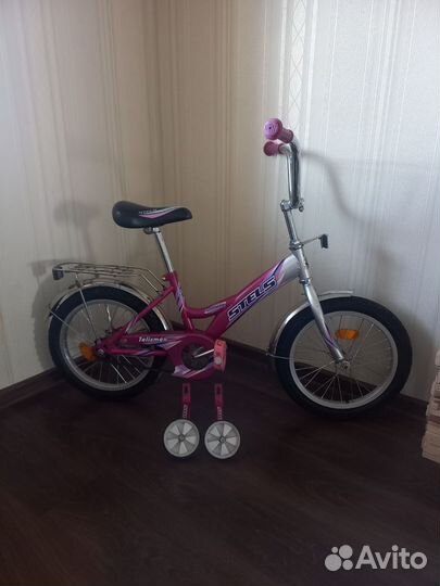 Велосипед для девочки 4-7 лет колёса 16