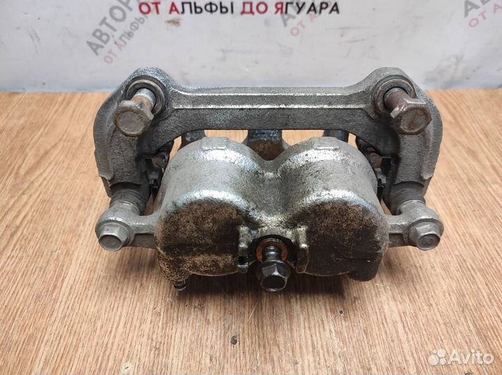 Суппорт передний левый Kia Mohave (HM) 2008-н.в