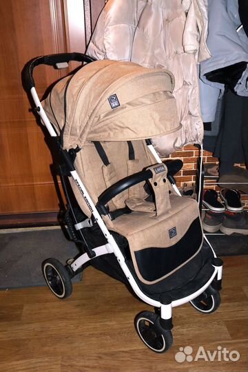 Всесезонная прогулочная коляска