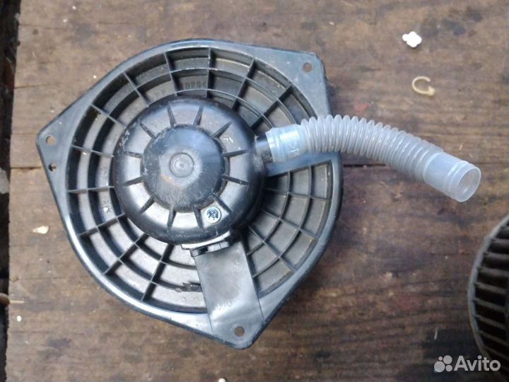 Моторчик отопителя Mitsubishi Lancer 10