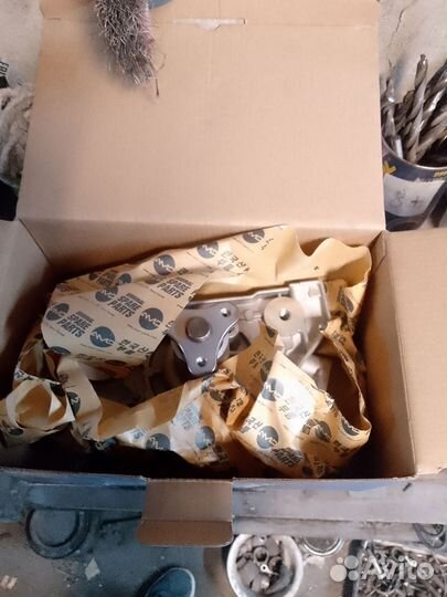 Помпа (Насос водяной) Kia Spectra