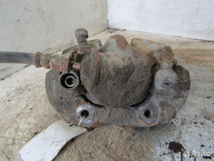 Суппорт передний Лев. Форд Tourneo 2004г 1.8л