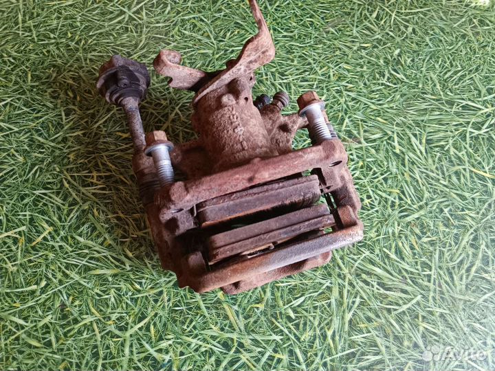 Суппорт задний левый Опель Астра J 2012 г