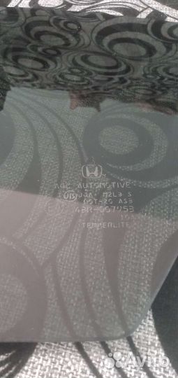 Стекло заднее левое