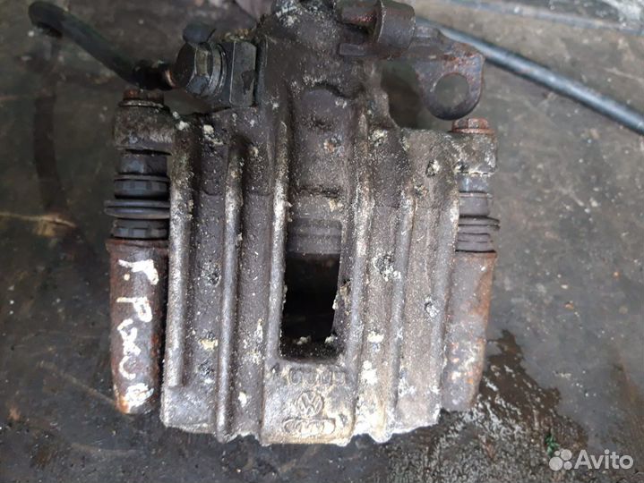 Суппорт задний тормозной Volkswagen Polo Skoda Rap