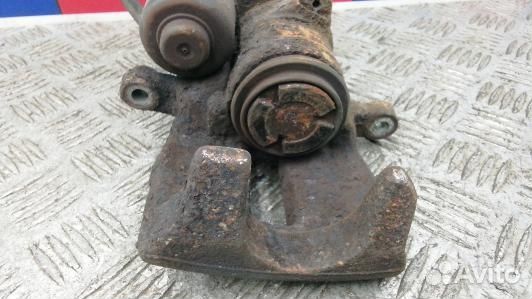 Суппорт тормозной задний левый volkswagen passat B