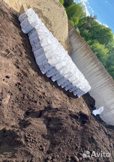 Доставка чернозема в мешках