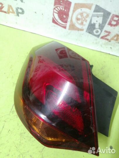 Фонарь задний левый Opel Astra J 1.4