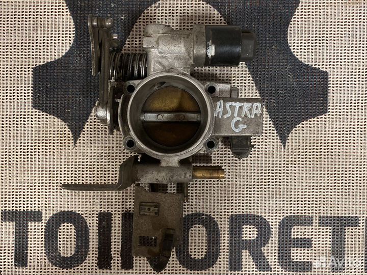 Дроссельная заслонка Opel 90529710