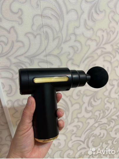 Перкуссионный массажный пистолет