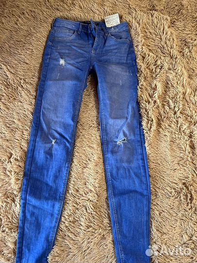 Джинсы новые
