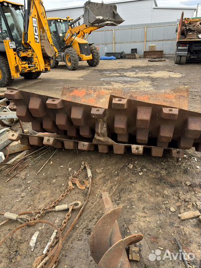 Кулачковый бандаж на грунтовой каток