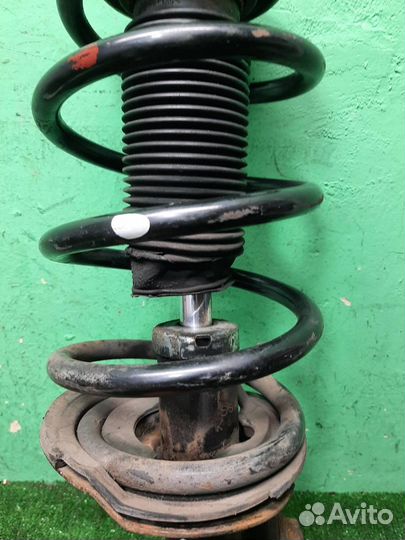 Стойка амортизатора передняя правая Ssangyong Act