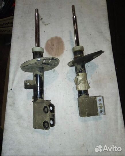 Амортизатор передний правый, левый Пежо Ситроен