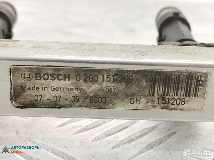 Форсунка Opel Corsa D 2007 55562250