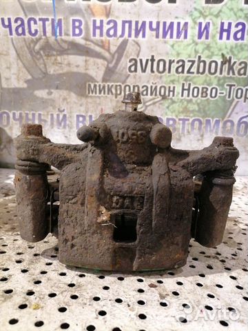 Суппорт задний правый Mazda Xedos 9