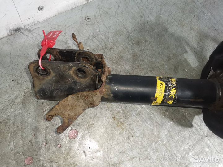 Стойка амортизатора передняя левая Dacia Sandero 2