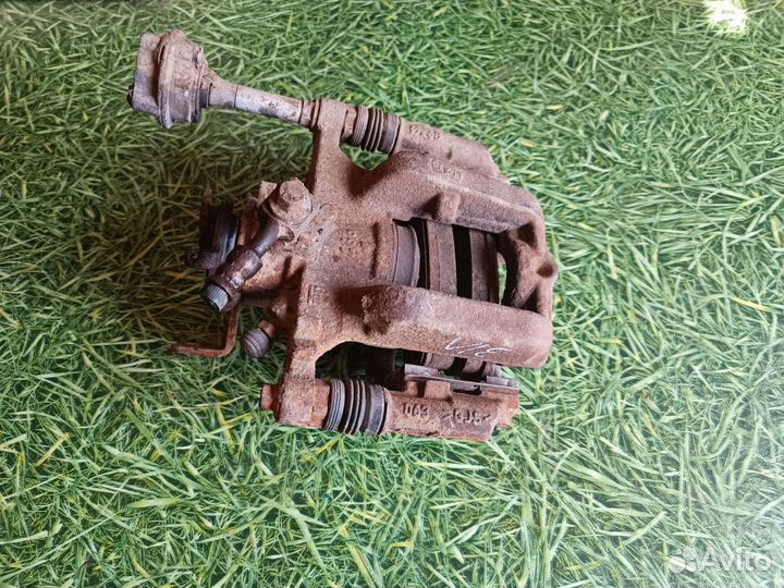 Суппорт задний левый Опель Астра J 2012 г