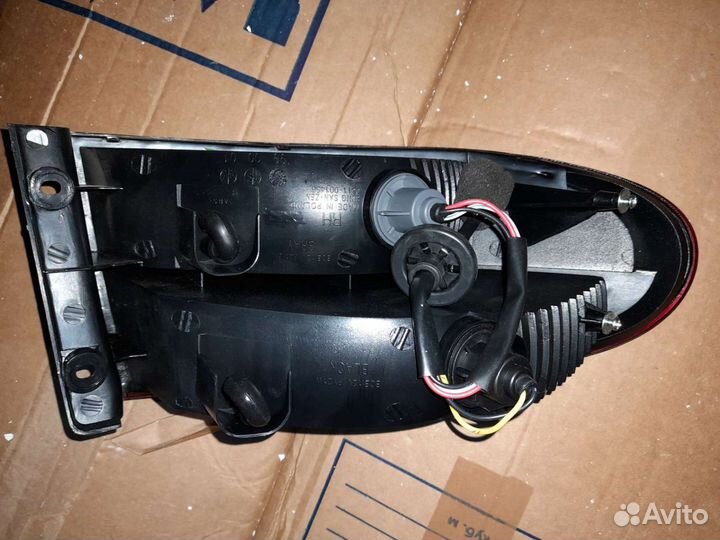 Фонарь задний наружный на chevrolet lanos (2004)