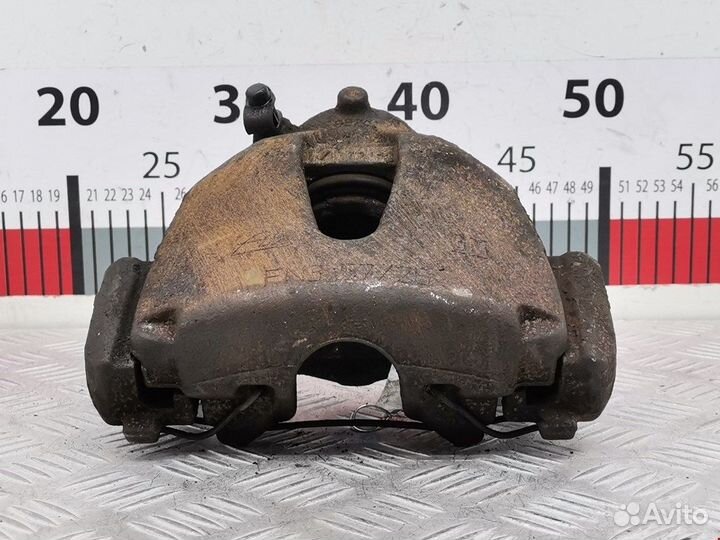 Суппорт передний правый для Opel Zafira B 95520047