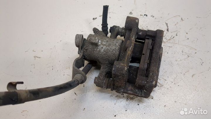 Суппорт левый задний Opel Astra H