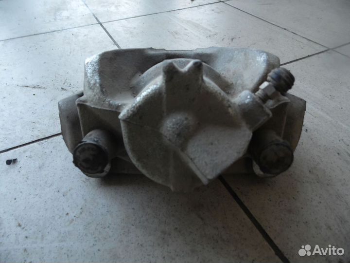 Суппорт тормозной передний правый Renault Duster 2