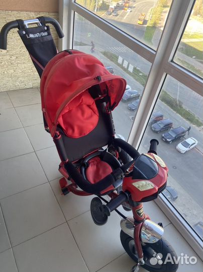 Трехколесный велосипед с ручкой