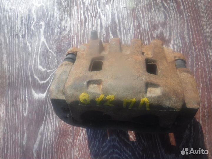 Суппорт передний Subaru Impreza (G12) 2007-2012