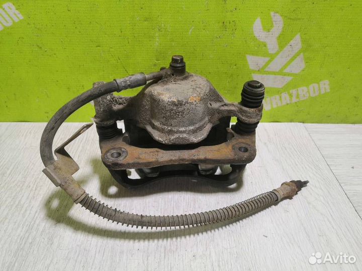 Суппорт передний левый Хендай Акцент 2