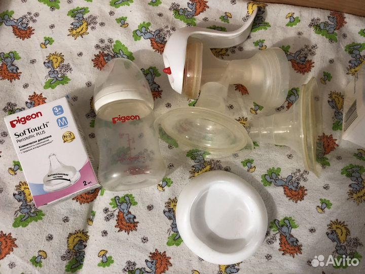 Молокоотсос ручной (+ 4 пакета для молока)