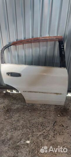 Дверь задняя правая на Nissan Skyline