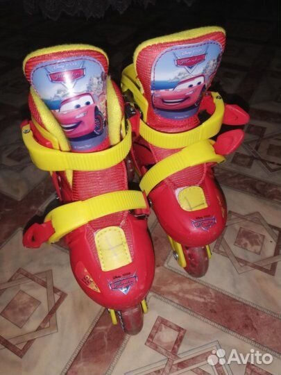 Роликовые коньки