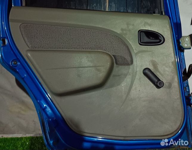 Обшивка двери задней левой Renault Logan