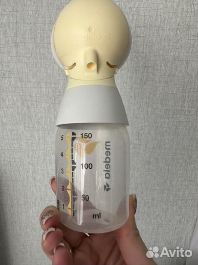 Молокоотсос medela электрический