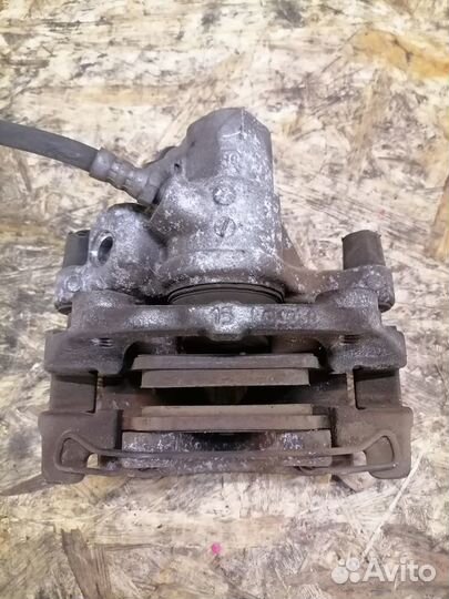 Тормозной суппорт задний правый Mazda 3 BL