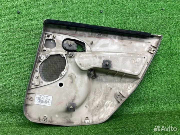 Обшивка двери задняя левая Ford Focus 1