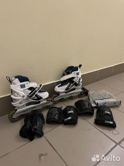 Роликовые коньки