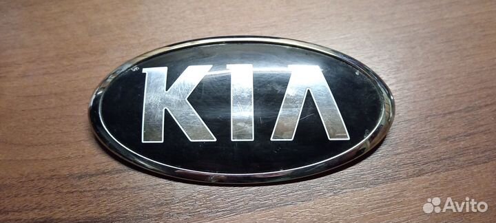 Эмблема задняя Kia Optima 4