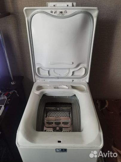 Стиральная машина с вертикальной загрузкой