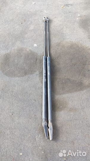 Амортизатор двери багажника Mitsubishi Colt Z34